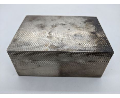 An Aspreys silver engine turned box, gilt interior, hallmarked London, 1935, 180g, H.4cm L.9cm