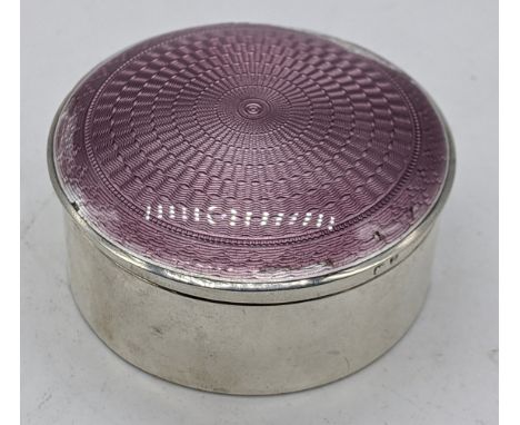An early 20th century purple guilloche enamel silver box, hallmarked Birmingham, 33g, D.6cm