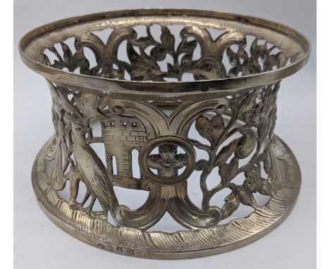 An Edwardian Irish silver potato ring by Elkington &amp; Co., decorated with scrolling flora and fauna, vacant cartouche, hal