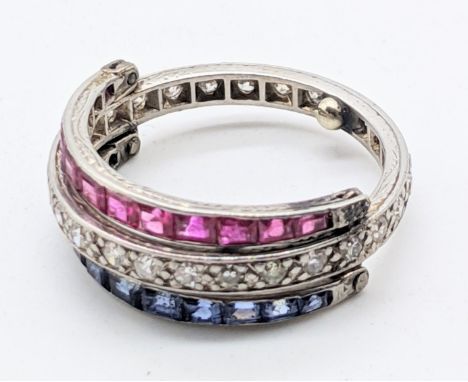 An early 20th century Ruby, Sapphire and Diamond eternity flip ring, single band on rose cut diamonds, two hinged tapered hal