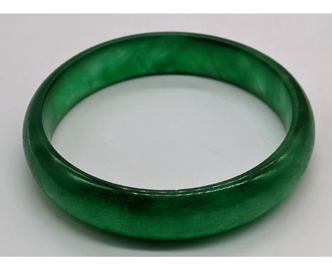 A green jade bangle