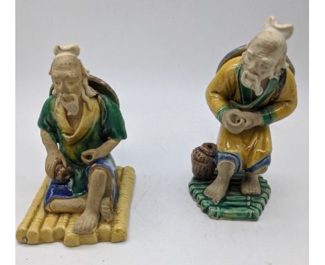 A set of two late 19th/early 20th century Chinese Shiwan ceramic Mudmen figures, H.11cm (tallest), W.6cm (widest)