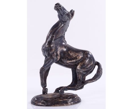A cast-silver "playing up" horse figure, by John Pinches Ltd, modelled by Lorne McKean for the British Horse Society, import 