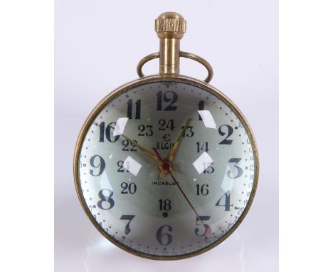 An Elgin bubble design desk clock, brass case with domed crystal front and back, case width 54mm, working order