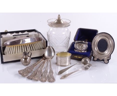 A silver-top preserve jar, brush, napkin ring etc