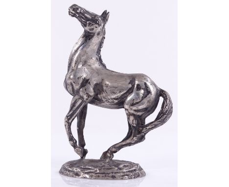 A cast-silver "playing up" horse figure, by John Pinches Ltd, modelled by Lorne McKean for the British Horse Society, import 