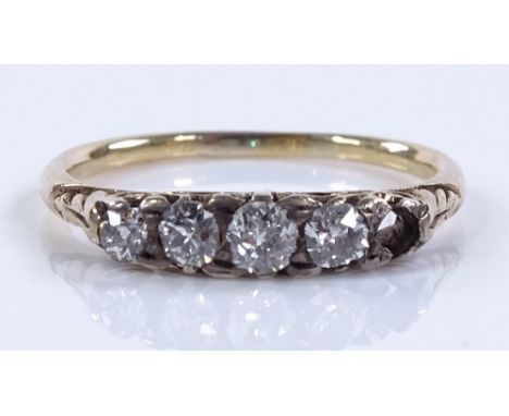 An unmarked gold 5-stone diamond ring, setting height 3.7mm, size N, 2.1g (1 stone missing)