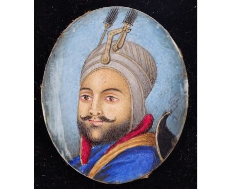 A 19th century Islamic miniature watercolour on ivory, portrait of a man, height 40mm, on velvet mount