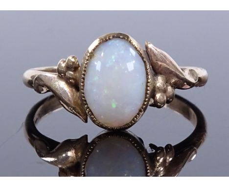 A 9ct gold cabochon opal ring, setting height 9.8mm, size N, 2.1g