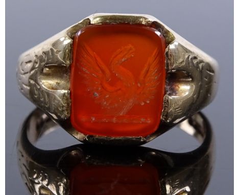 A 9ct gold Carnelion Intaglio seal ring, setting height 13.8mm, size T1/2, 6.3g
