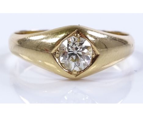 An 18ct gold solitaire diamond gypsy ring, diamond approx 0.5cts, setting height 8.1mm, size P, 4g