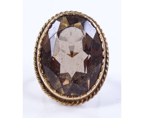 A large 9ct gold smokey quartz ring, setting height 28.9mm, size M, 13.1g