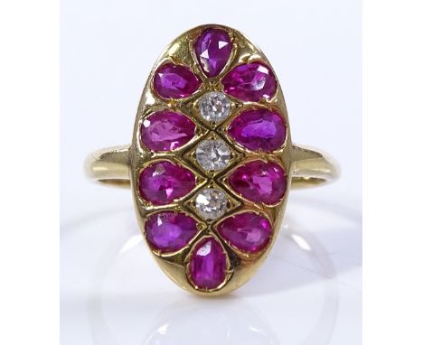 An 18ct gold ruby and diamond cluster panel ring, setting height 15.7mm, size F, 2.3g