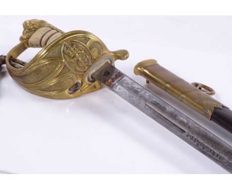 A Navy Officer's dress sword, by E J Whitaker of Chatham, cast-brass bowl hilt with shagreen grips, original brass-mounted le