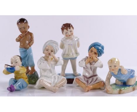 A set of Royal Worcester figures, children of the world, modelled by F Doughty, plus one other (6)