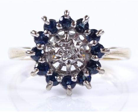 An 18ct gold sapphire and diamond cluster ring, setting height 12.6mm, size L, 3.5g