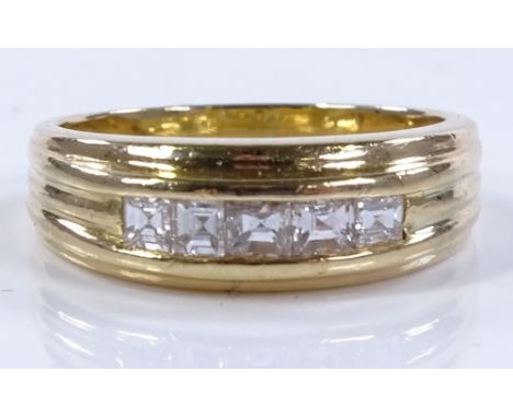 An 18ct gold 5-stone diamond ring, channel set with square-cut diamonds, setting height 6.5mm, size N, 5.5g