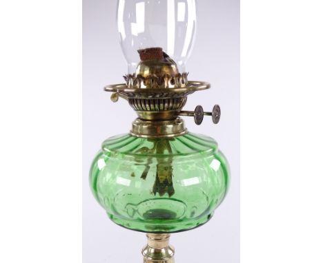 A Victorian duplex brass and green glass oil lamp, height including chimney 65cm