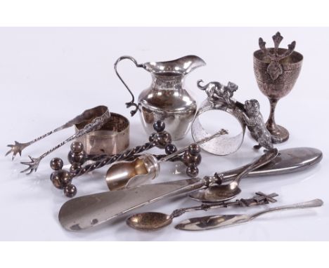 A silver cream jug, a silver caddy spoon, WMF novelty napkin ring etc