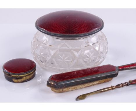 A silver and red enamel 4-piece dressing table set, by Barker Brothers Silver Ltd, Birmingham 1932, powder jar lid diameter 8