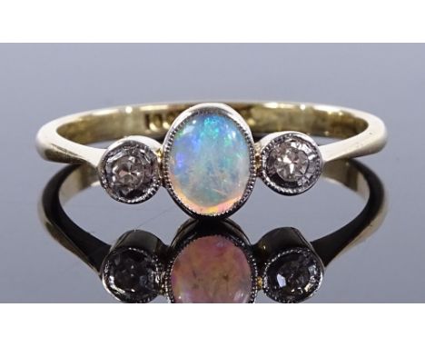 An 18ct gold 3-stone opal and diamond ring, setting height 6.1mm, size N, 2.1g