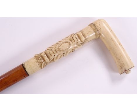 A 19th century carved bone-handled walking stick