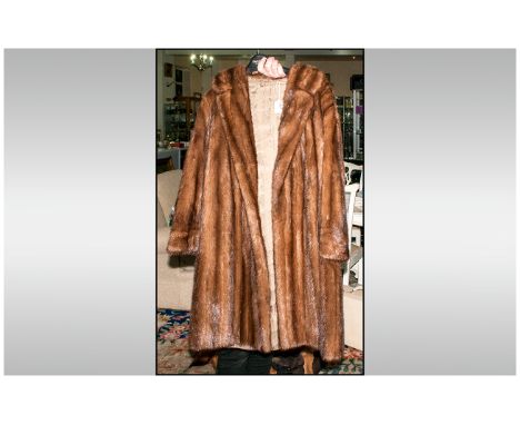 Ladies Full Length Light Brown Mink Coat, fully lined, collar with revers. Slit pockets. Half Back Belt with button decoratio