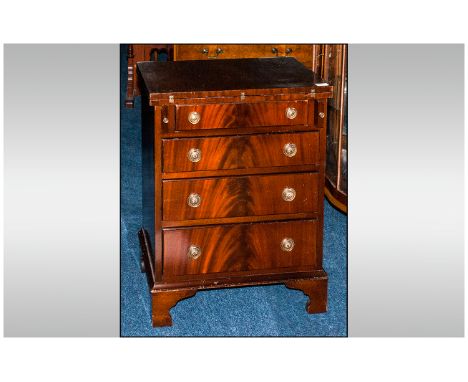 Reproduction Mahogany George I Style Bachelor Chest with flap top, on four graduated drawers, on bracket feet. 30 inches high
