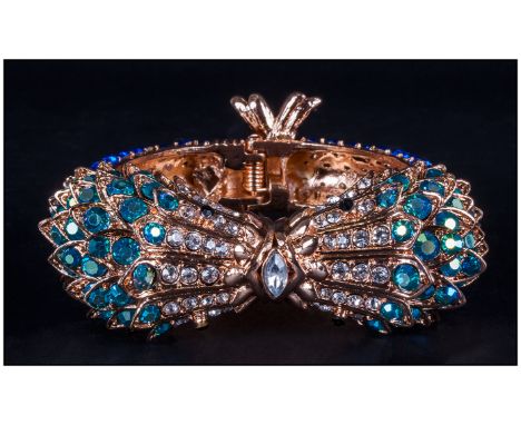 Large 'Kissing Fish' Bangle, set with turquoise Aurora Borealis crystals to the heads of the fish, which 'kiss' at the centre