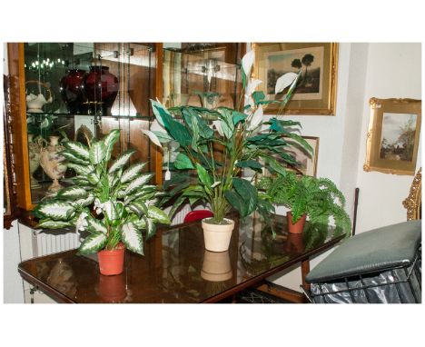 Collection of Assorted Plastic House Plants including ceramic planters.