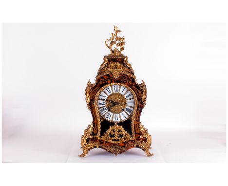 20th Century French Large Boulework Style And Brass Mounted 8 Day Striking Mantle Clock with the style of Louis XIV, 23'' in 