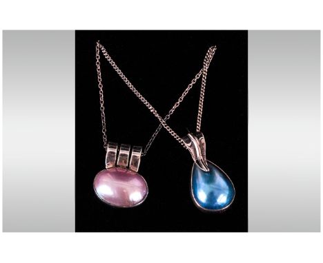 Two Various Mabe Pearl Pendants, one oval pink with triple bale, the other blue with a leaf shaped bale, both in sterling sil