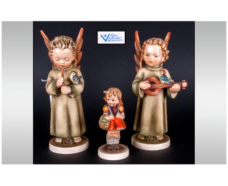 Goebel Hummel Figures, 2 in total. Angels playing musical instruments with little birds watching. 7.75'' in height. plus one 