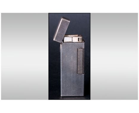 Dunhill Cigarette Lighter Engine Turned White Metal Body, Complete With Box And Paper Work. 