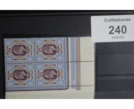 S.G. 307a KING EDWARD 9d DEEP PLUM AND BLUE, an UN/M bottom left corner marginal block of four