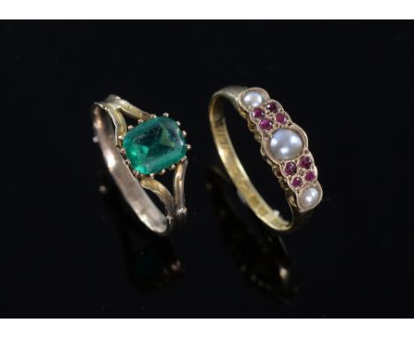 Early 20th C ruby and pearl eternity ring mounted in 18ct yellow gold, 1922. and a  green paste ring 