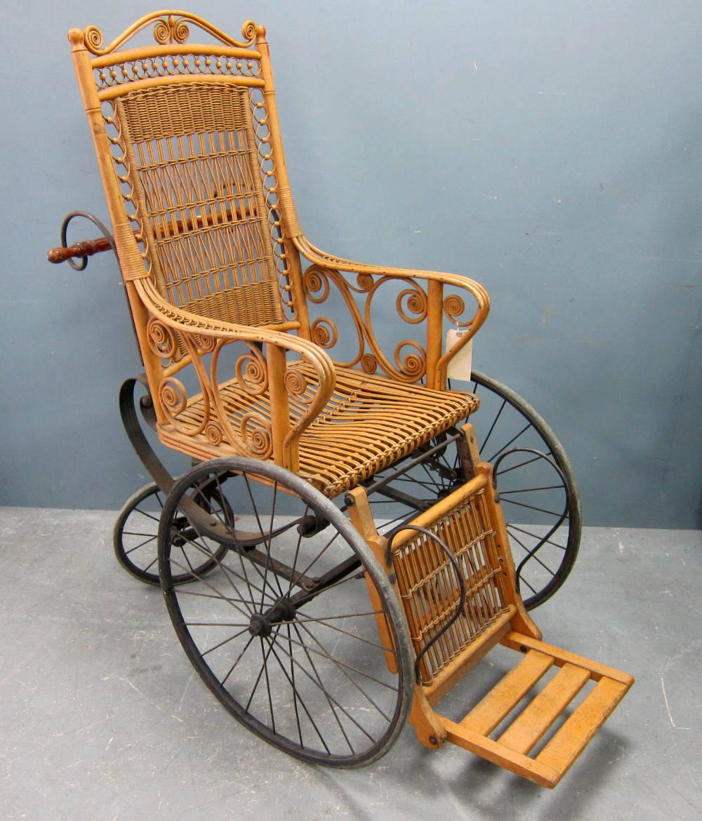 Victorian cast metal and wicker bath chair 135cm high