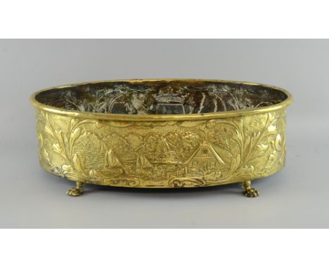 19th century Dutch brass oval planter embossed with landscape, 43cm wide,