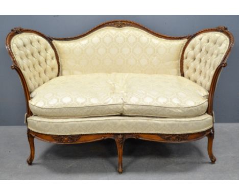 Early 20th century walnut framed cream upholstered settee with button back decoration to sides, on cabriole legs 140cm wide