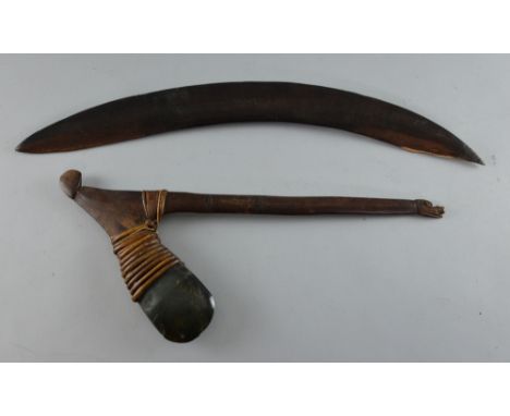 Mid 20th century Maori style War axe with stone blade mounted with reeds to a hard wood handle, 50cm, and a carved wood boome