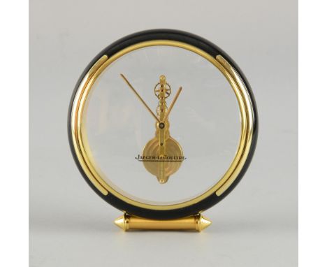 Jaeger LeCoultre, eight day skeleton clock, late 20th century. Round lacquered brass case, eight day Jaeger LeCoultre skeleto