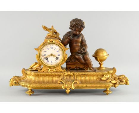 French mantel clock with cherub  with a globe  finial enamelled face,  twin train movement 30cm high 