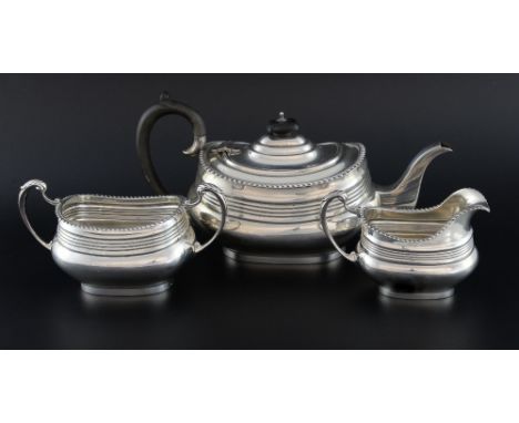 George V silver three piece tea service with gadrooned rims, by Blackmore & Fletcher Ltd., London, 1924, gross weight 31.5oz,