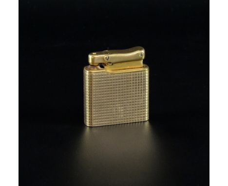Colibri gold lighter, with engine turned finish,  stamped monogas, gross weight, 73.2 grams 