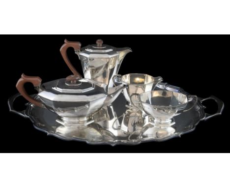 Modern silver four piece tea service of octagonal section by Garrard & Co. Ltd., Sheffield, 1958 and a twin-handled tray with