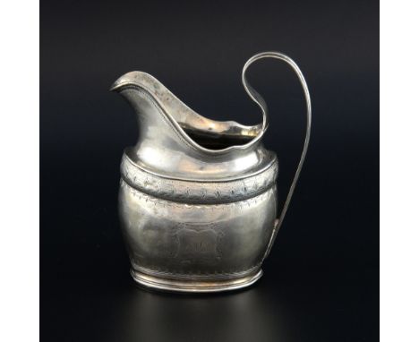 George III Irish silver helmet shaped cream jug with bright cut decoration, no maker's mark, Dublin, 1801, 5.5oz, 171g,