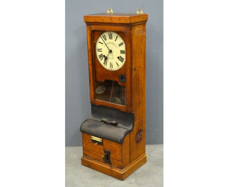 Oak cased clocking in clock by The Time Recorder Supply & Maintenance Co., 98cm x 34cm x 28cm,