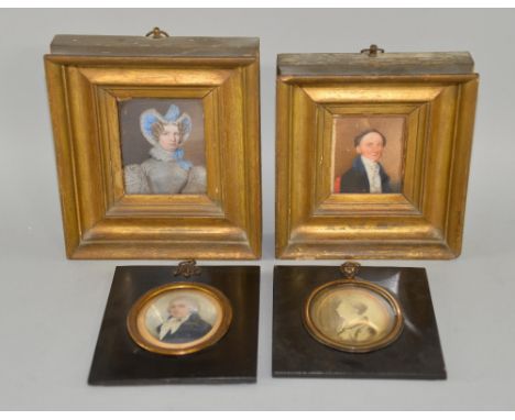 Pair of 19th century portrait miniatures of a man and wife 9cm x 7cm and two others each 7cm x 6cm, 