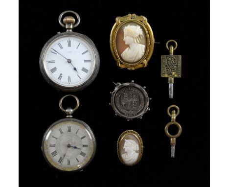 Cameo brooches and pocket watches, two Victorian cameo brooches in gilt metal mounts, a silver coin brooch dated 1887, silver