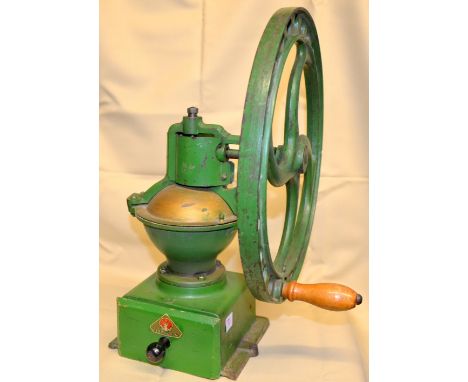 Large Dienes green cast-iron side wheel table mill with closed hopper and wooden drawer,